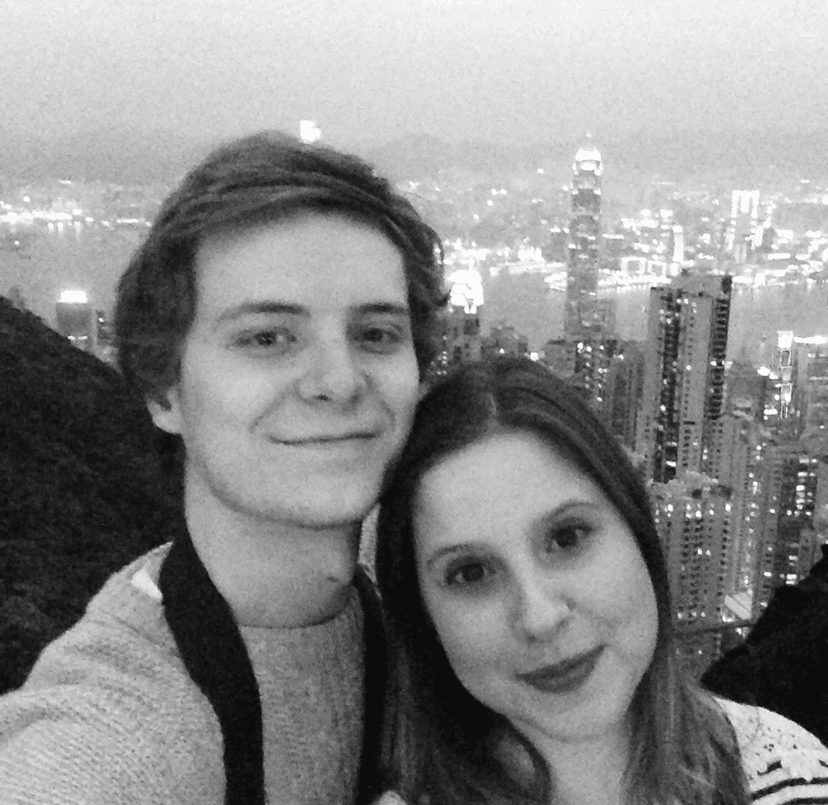 Cristina and Aran in Hong Kong, with the city in the background